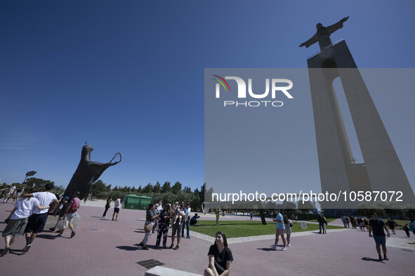 Several tourists are seen walking around the vicinity of the monument of Christ the King, in Almada, Lisbon. 04 September 2023. The National...