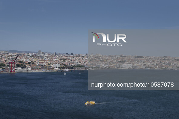 General view of the city of Lisbo and the Tejo river, seen from one of the viewpoints near the monument of Christ the King, in Almada, Lisbo...