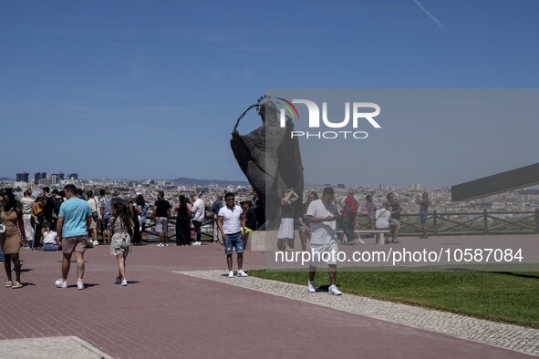 Several tourists are seen walking around the vicinity of the monument of Christ the King, in Almada, Lisbon. 04 September 2023. The National...