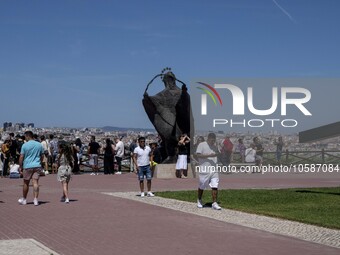 Several tourists are seen walking around the vicinity of the monument of Christ the King, in Almada, Lisbon. 04 September 2023. The National...