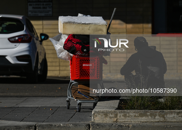 EDMONTON, CANADA - SEPTEMBER 29, 2023:
A homeless person outside a shop in downtown Calgary, on September 29, 2023, in Edmonton, Alberta, Ca...