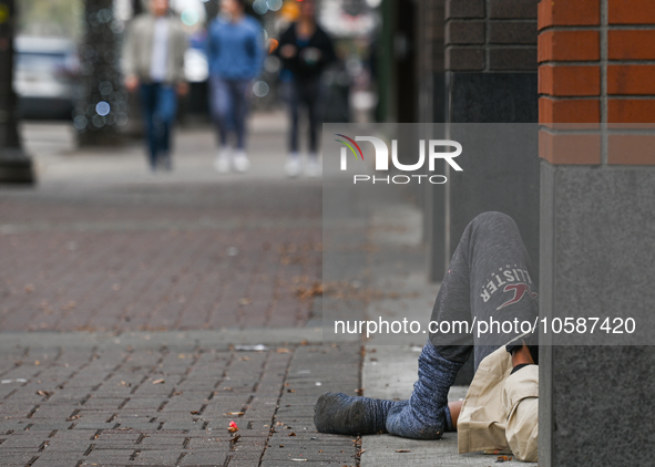 EDMONTON, CANADA - SEPTEMBER 29, 2023:
A homeless person on a street in downtown Edmonton, on September 29, 2023, in Edmonton, Alberta, Cana...