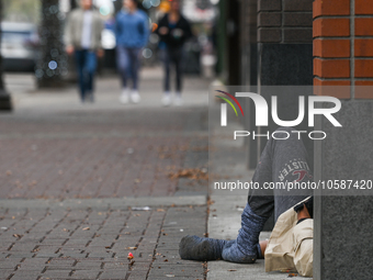 EDMONTON, CANADA - SEPTEMBER 29, 2023:
A homeless person on a street in downtown Edmonton, on September 29, 2023, in Edmonton, Alberta, Cana...