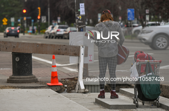 EDMONTON, CANADA - SEPTEMBER 29, 2023:
A busker performing in downtown Edmonton, on September 29, 2023, in Edmonton, Alberta, Canada.
Canada...