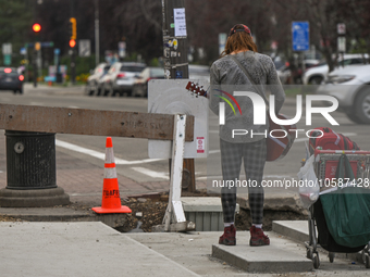 EDMONTON, CANADA - SEPTEMBER 29, 2023:
A busker performing in downtown Edmonton, on September 29, 2023, in Edmonton, Alberta, Canada.
Canada...