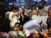 Students from the University of Al-aqsa celebrate graduation during an annual ceremony, in Khan Yunis in the southern Gaza Strip, on October...