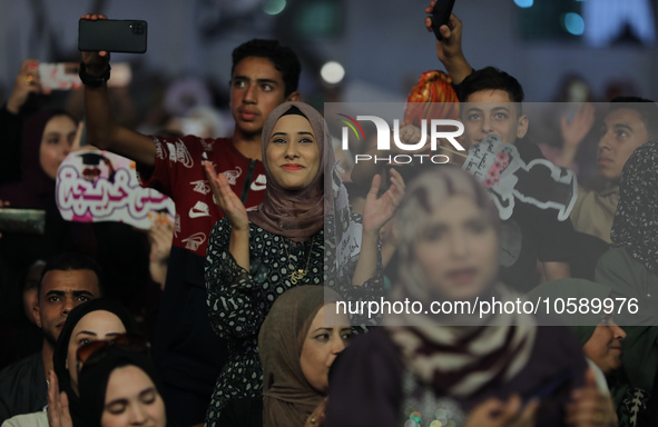 Students from the University of Al-aqsa celebrate graduation during an annual ceremony, in Khan Yunis in the southern Gaza Strip, on October...