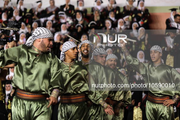 Students from the University of Al-aqsa celebrate graduation during an annual ceremony, in Khan Yunis in the southern Gaza Strip, on October...