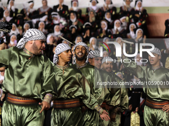 Students from the University of Al-aqsa celebrate graduation during an annual ceremony, in Khan Yunis in the southern Gaza Strip, on October...