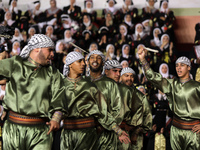 Students from the University of Al-aqsa celebrate graduation during an annual ceremony, in Khan Yunis in the southern Gaza Strip, on October...