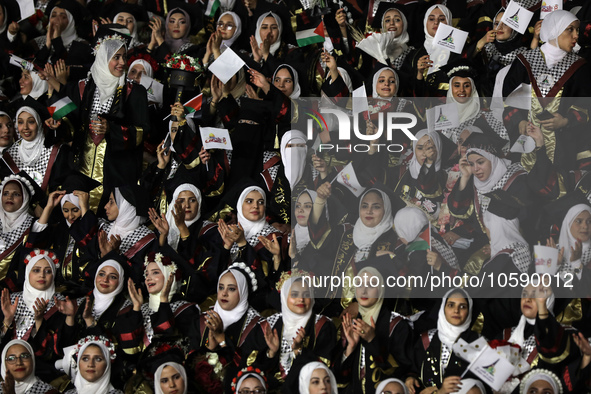 Students from the University of Al-aqsa celebrate graduation during an annual ceremony, in Khan Yunis in the southern Gaza Strip, on October...