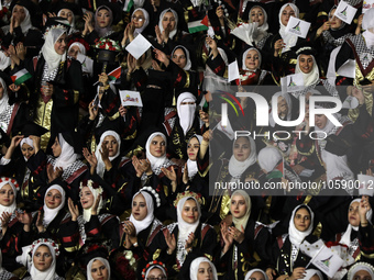 Students from the University of Al-aqsa celebrate graduation during an annual ceremony, in Khan Yunis in the southern Gaza Strip, on October...