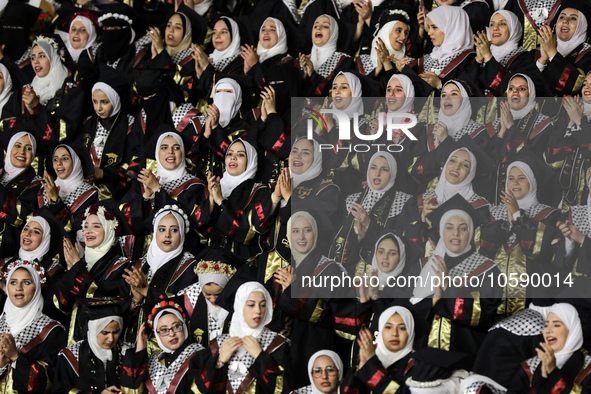 Students from the University of Al-aqsa celebrate graduation during an annual ceremony, in Khan Yunis in the southern Gaza Strip, on October...