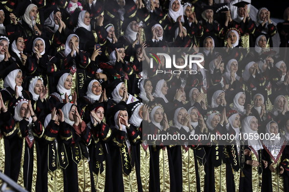 Students from the University of Al-aqsa celebrate graduation during an annual ceremony, in Khan Yunis in the southern Gaza Strip, on October...