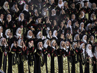 Students from the University of Al-aqsa celebrate graduation during an annual ceremony, in Khan Yunis in the southern Gaza Strip, on October...