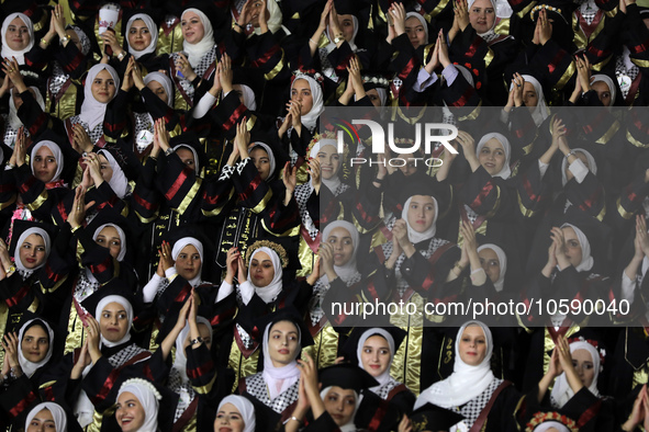 Students from the University of Al-aqsa celebrate graduation during an annual ceremony, in Khan Yunis in the southern Gaza Strip, on October...