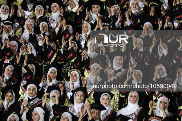 Students from the University of Al-aqsa celebrate graduation during an annual ceremony, in Khan Yunis in the southern Gaza Strip, on October...