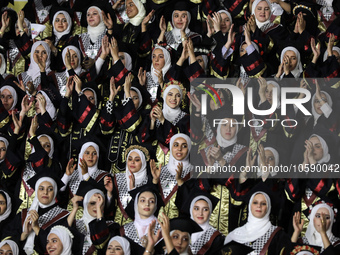 Students from the University of Al-aqsa celebrate graduation during an annual ceremony, in Khan Yunis in the southern Gaza Strip, on October...