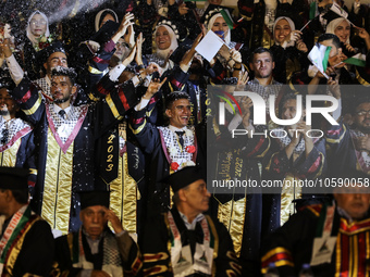 Students from the University of Al-aqsa celebrate graduation during an annual ceremony, in Khan Yunis in the southern Gaza Strip, on October...