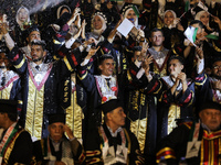 Students from the University of Al-aqsa celebrate graduation during an annual ceremony, in Khan Yunis in the southern Gaza Strip, on October...