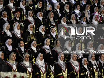 Students from the University of Al-aqsa celebrate graduation during an annual ceremony, in Khan Yunis in the southern Gaza Strip, on October...