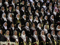 Students from the University of Al-aqsa celebrate graduation during an annual ceremony, in Khan Yunis in the southern Gaza Strip, on October...