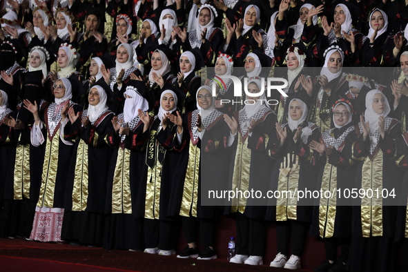 Students from the University of Al-aqsa celebrate graduation during an annual ceremony, in Khan Yunis in the southern Gaza Strip, on October...