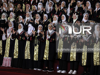 Students from the University of Al-aqsa celebrate graduation during an annual ceremony, in Khan Yunis in the southern Gaza Strip, on October...