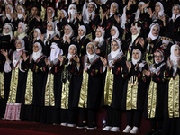 Students from the University of Al-aqsa celebrate graduation during an annual ceremony, in Khan Yunis in the southern Gaza Strip, on October...