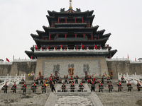 Students practice the ''Battle drum of the Qin and Han Dynasties'' below the Wei River in Xianyang City, Shaanxi Province, China, Oct 8, 202...