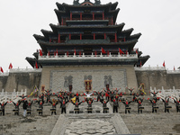 Huang Jianmin, an inheritor of the Qin and Han Dynasty battle drum, practices the ''Qin and Han Dynasty battle drum'' with students at the d...