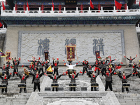 Huang Jianmin, an inheritor of the Qin and Han Dynasty battle drum, practices the ''Qin and Han Dynasty battle drum'' with students at the d...