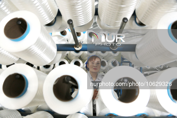 LIANYUNGANG, CHINA - OCTOBER 12, 2023 - A worker works at a workshop of a new materials company in Lianyungang, East China's Jiangsu Provinc...