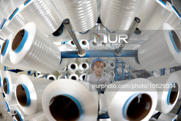 LIANYUNGANG, CHINA - OCTOBER 12, 2023 - A worker works at a workshop of a new materials company in Lianyungang, East China's Jiangsu Provinc...