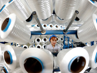 LIANYUNGANG, CHINA - OCTOBER 12, 2023 - A worker works at a workshop of a new materials company in Lianyungang, East China's Jiangsu Provinc...