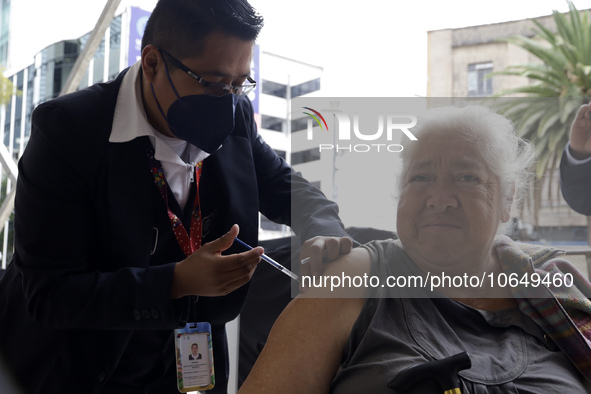 October 16, 2023, Mexico City, Mexico: Citizens are vaccinated at the start of the national vaccination campaign against influenza and Covid...