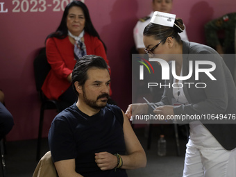 October 16, 2023, Mexico City, Mexico: The director of the Mexican Social Security Institute, Zoe Robledo, is vaccinated against influenza a...