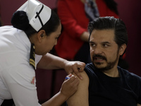 October 16, 2023, Mexico City, Mexico: The director of the Mexican Social Security Institute, Zoe Robledo, is vaccinated against influenza a...