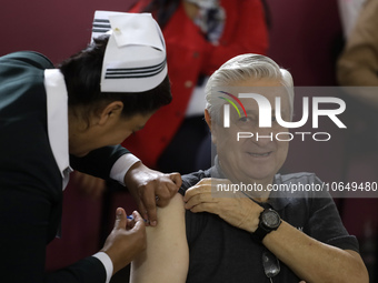 October 16, 2023, Mexico City, Mexico: Citizens are vaccinated at the start of the national vaccination campaign against influenza and Covid...