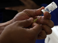 October 16, 2023, Mexico City, Mexico: Health personnel from the Mexican Institute of Social Security and the Armed Forces prepare the vacci...