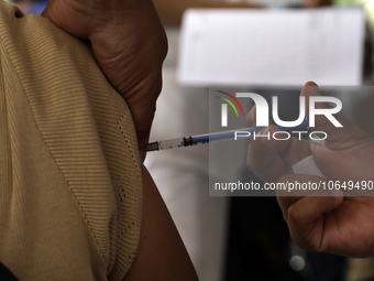 October 16, 2023, Mexico City, Mexico: Citizens are vaccinated at the start of the national vaccination campaign against influenza and Covid...