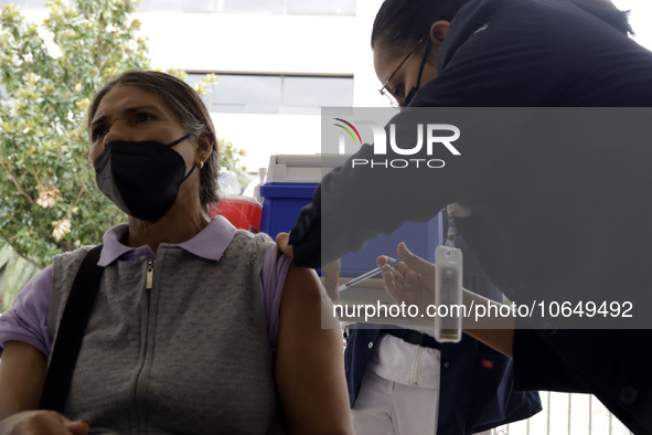 October 16, 2023, Mexico City, Mexico: Citizens are vaccinated at the start of the national vaccination campaign against influenza and Covid...