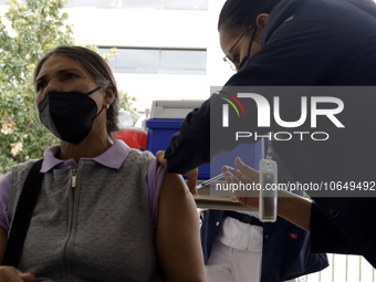 October 16, 2023, Mexico City, Mexico: Citizens are vaccinated at the start of the national vaccination campaign against influenza and Covid...