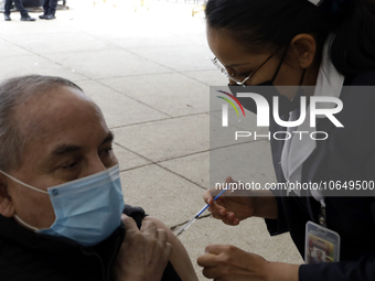 October 16, 2023, Mexico City, Mexico: Citizens are vaccinated at the start of the national vaccination campaign against influenza and Covid...