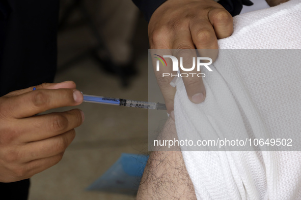 October 16, 2023, Mexico City, Mexico: Citizens are vaccinated at the start of the national vaccination campaign against influenza and Covid...