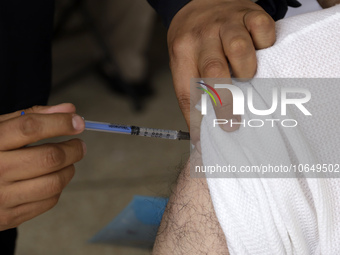 October 16, 2023, Mexico City, Mexico: Citizens are vaccinated at the start of the national vaccination campaign against influenza and Covid...