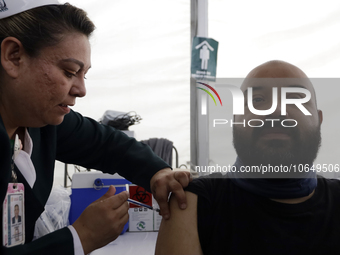 October 16, 2023, Mexico City, Mexico: Citizens are vaccinated at the start of the national vaccination campaign against influenza and Covid...