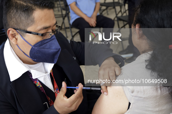 October 16, 2023, Mexico City, Mexico: Citizens are vaccinated at the start of the national vaccination campaign against influenza and Covid...