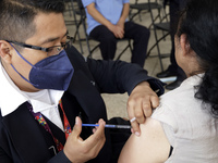 October 16, 2023, Mexico City, Mexico: Citizens are vaccinated at the start of the national vaccination campaign against influenza and Covid...