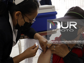 October 16, 2023, Mexico City, Mexico: Citizens are vaccinated at the start of the national vaccination campaign against influenza and Covid...